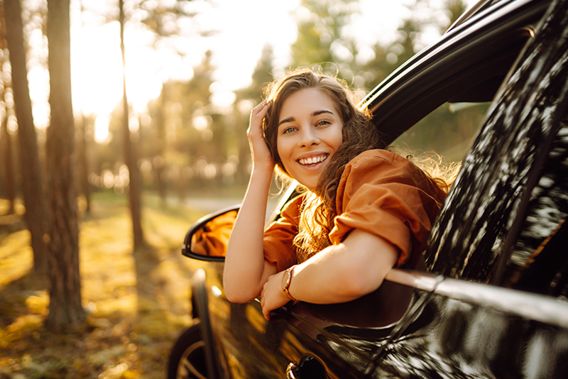 Happy women in a car