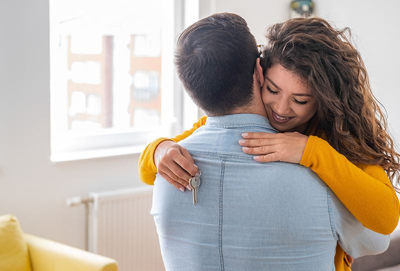 Happy Couple with house keys